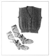 Black and white photo of knitted vest and argyle socks