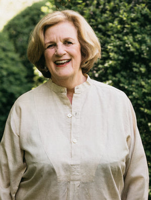 Photo of woman wearing victorian shirt.  Photo highlights front opening and bib-front.