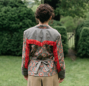 Back view of brunette woman wearing 242 Rodeo Cowgirl Jacket showing the shoulder yoke