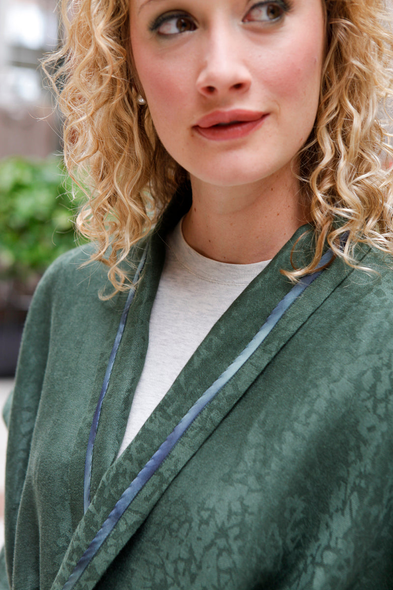 close up of blonde white woman v-neck of the 254 Swing Coat.