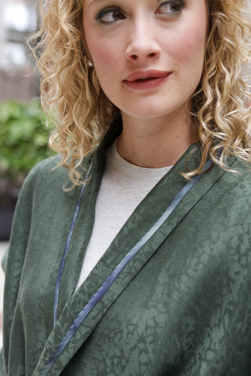 close up of blonde white woman v-neck of the 254 Swing Coat.