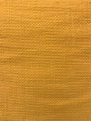 cotton jacquard fabric in marigold yellow