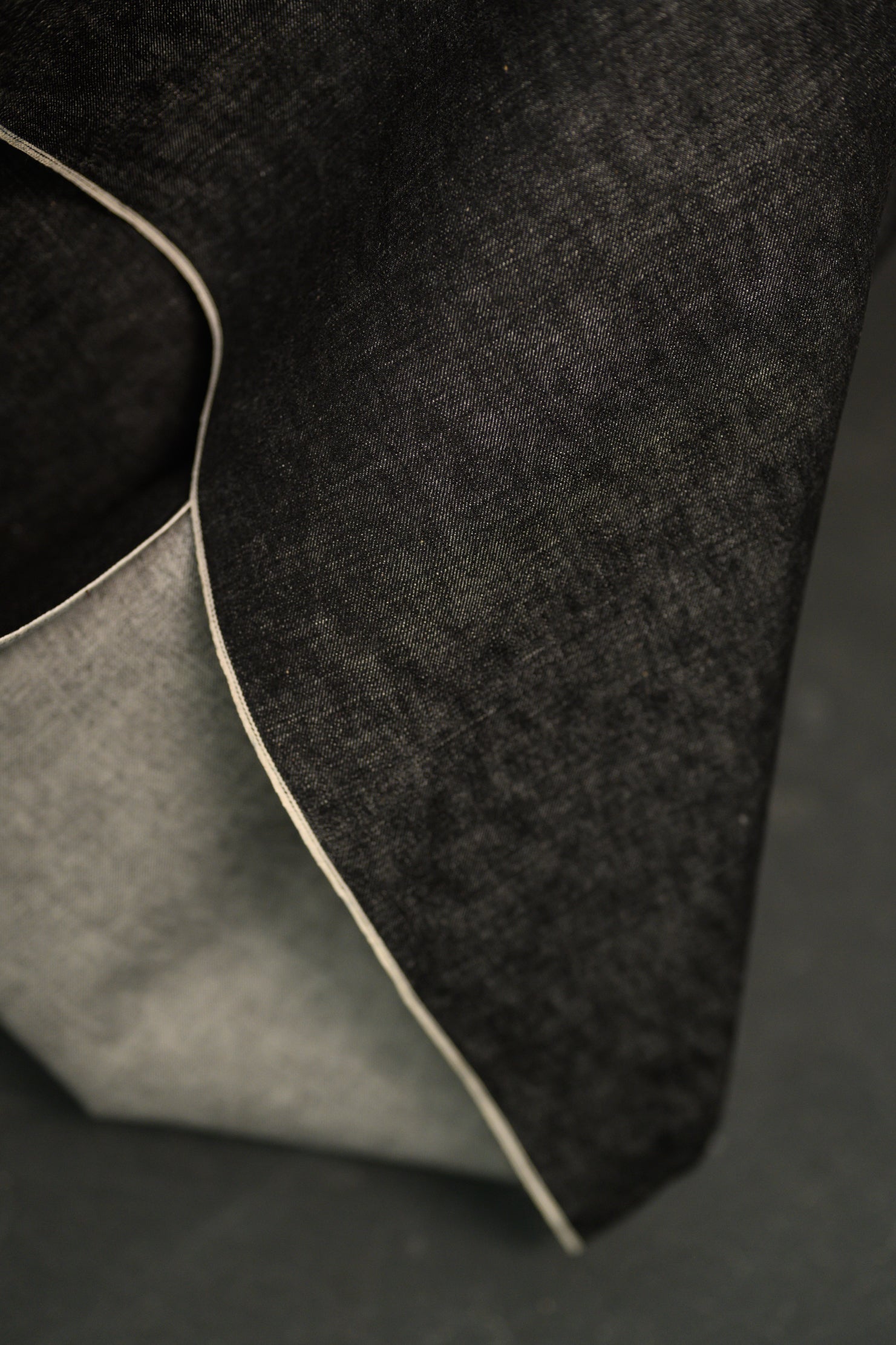 inky black Japanese-made selvage denim fabric detail image 